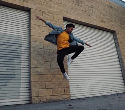 Photo of Ryan Phuong while practicing a dance move